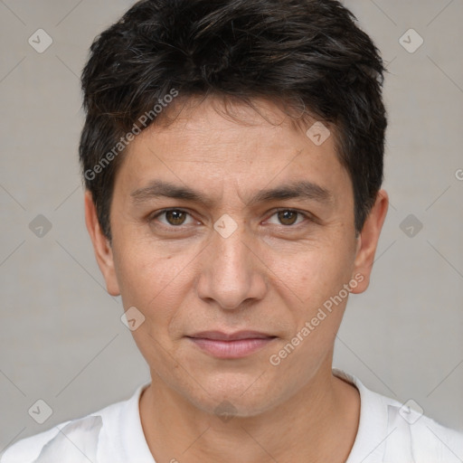 Joyful white adult male with short  brown hair and brown eyes