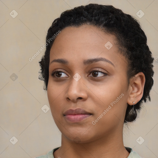 Neutral black young-adult female with short  black hair and brown eyes