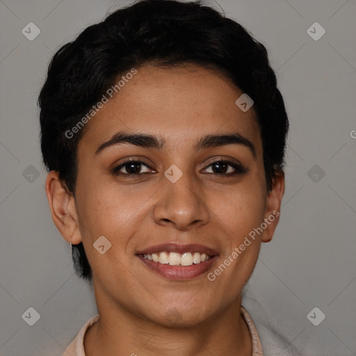 Joyful latino young-adult female with short  brown hair and brown eyes