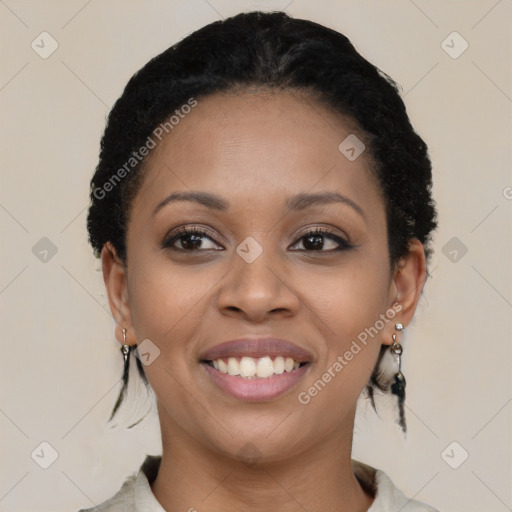Joyful black young-adult female with short  black hair and brown eyes