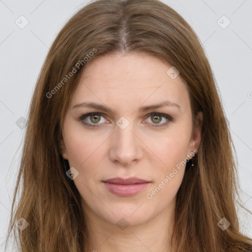 Joyful white young-adult female with long  brown hair and green eyes