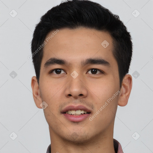 Joyful asian young-adult male with short  black hair and brown eyes