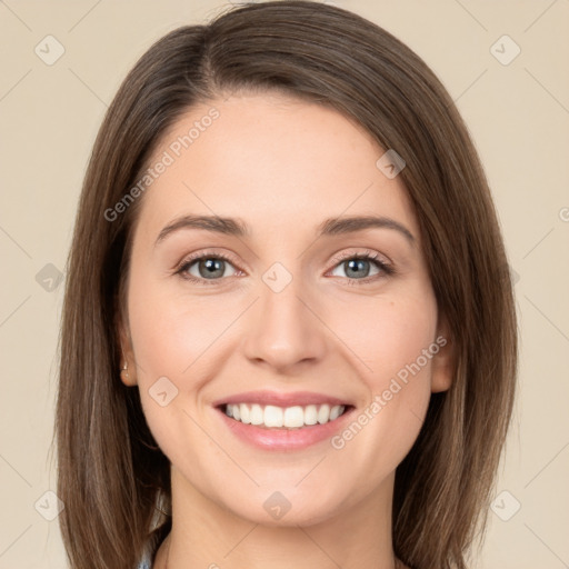 Joyful white young-adult female with long  brown hair and green eyes