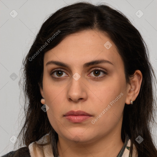 Neutral white young-adult female with long  brown hair and brown eyes