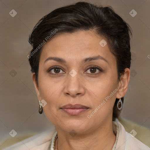 Joyful white adult female with short  brown hair and brown eyes