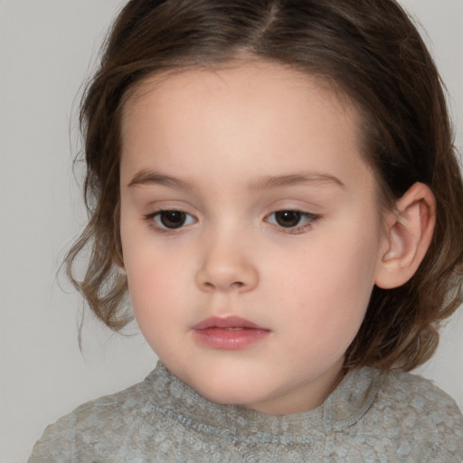 Neutral white child female with medium  brown hair and brown eyes