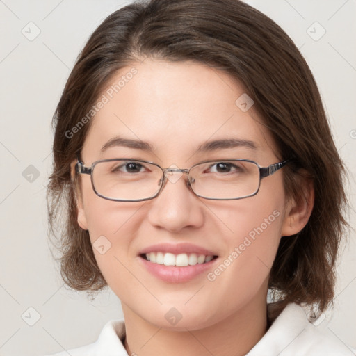 Joyful white young-adult female with medium  brown hair and brown eyes