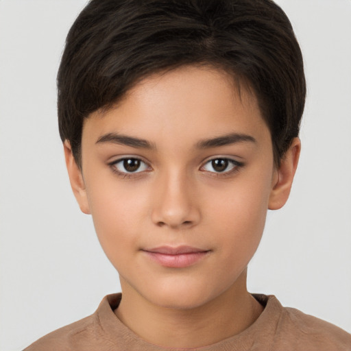 Joyful white child female with short  brown hair and brown eyes