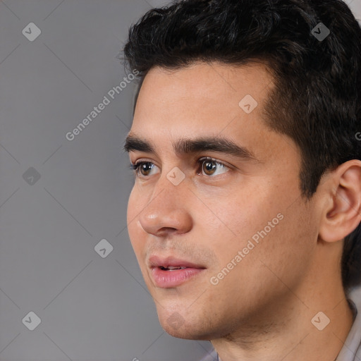 Neutral white young-adult male with short  black hair and brown eyes