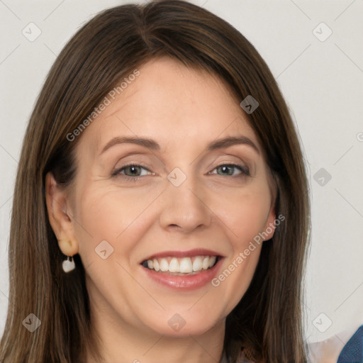 Joyful white adult female with medium  brown hair and grey eyes