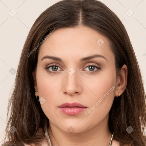 Neutral white young-adult female with long  brown hair and brown eyes