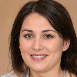 Joyful white young-adult female with medium  brown hair and brown eyes