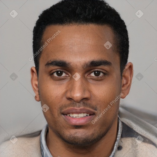 Joyful black young-adult male with short  black hair and brown eyes