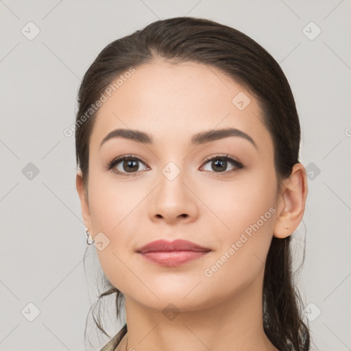 Neutral white young-adult female with long  brown hair and brown eyes