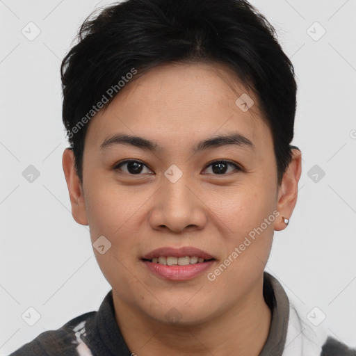 Joyful asian young-adult female with short  black hair and brown eyes