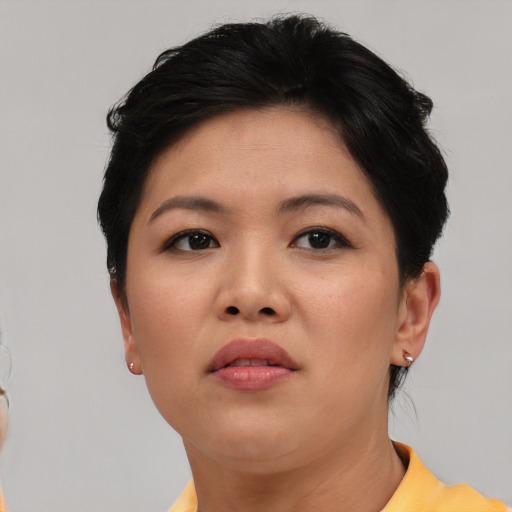 Neutral asian young-adult female with short  brown hair and brown eyes