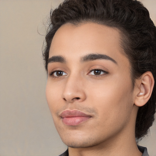 Joyful white young-adult male with medium  brown hair and brown eyes