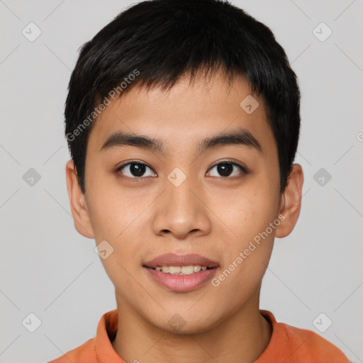 Joyful asian young-adult male with short  black hair and brown eyes