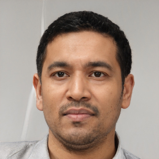 Neutral asian young-adult male with short  black hair and brown eyes