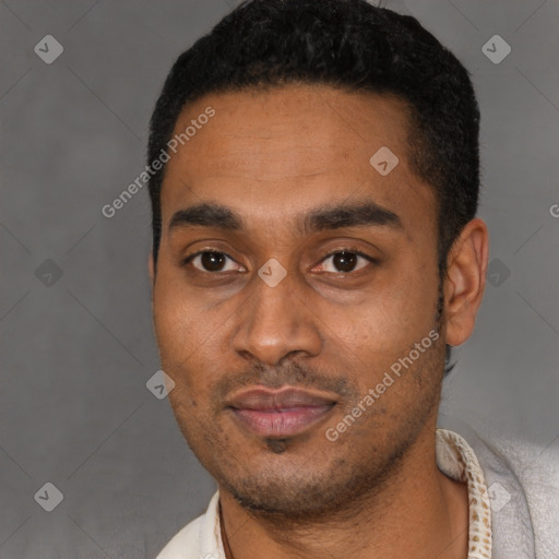 Joyful latino young-adult male with short  black hair and brown eyes