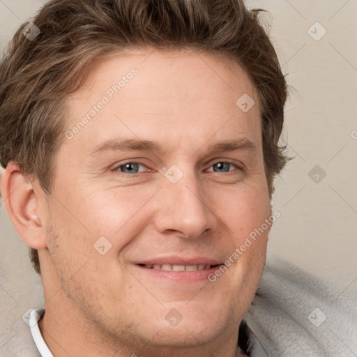 Joyful white adult male with short  brown hair and grey eyes