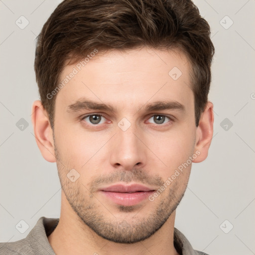 Neutral white young-adult male with short  brown hair and grey eyes