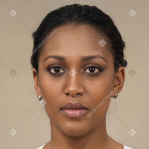 Neutral black young-adult female with short  brown hair and brown eyes