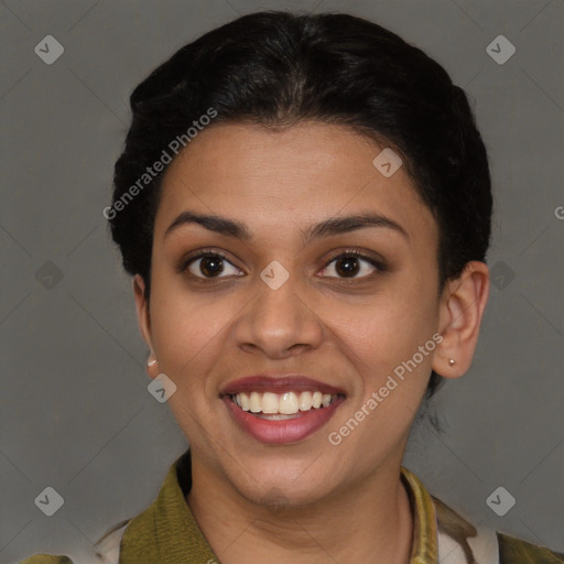 Joyful latino young-adult female with short  brown hair and brown eyes