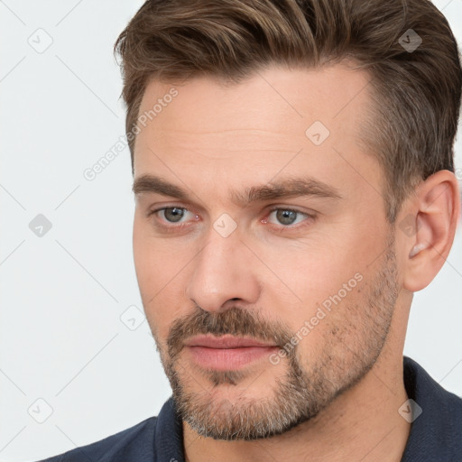 Neutral white adult male with short  brown hair and brown eyes