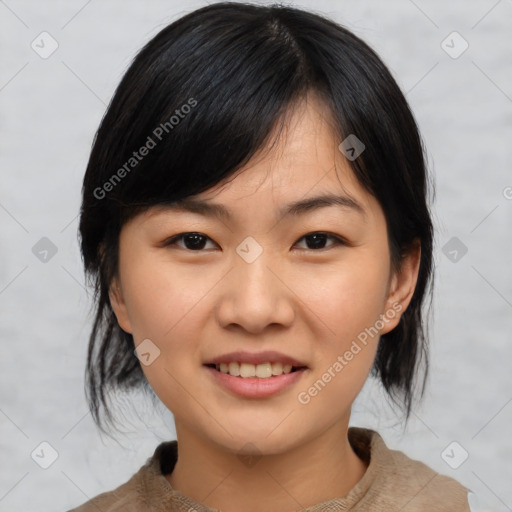 Joyful asian young-adult female with medium  black hair and brown eyes