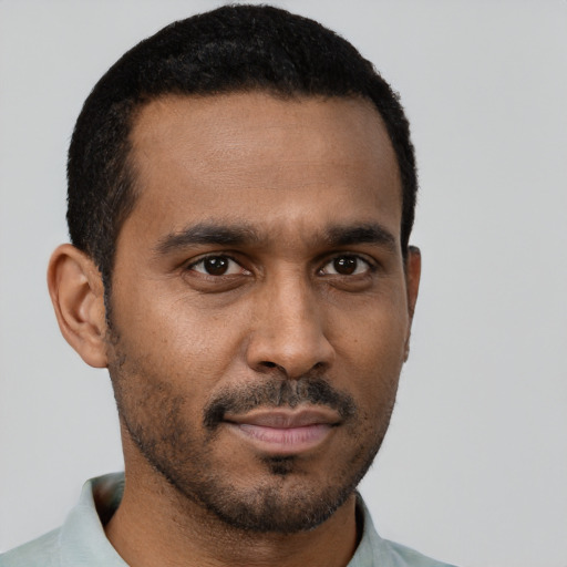 Neutral black young-adult male with short  brown hair and brown eyes