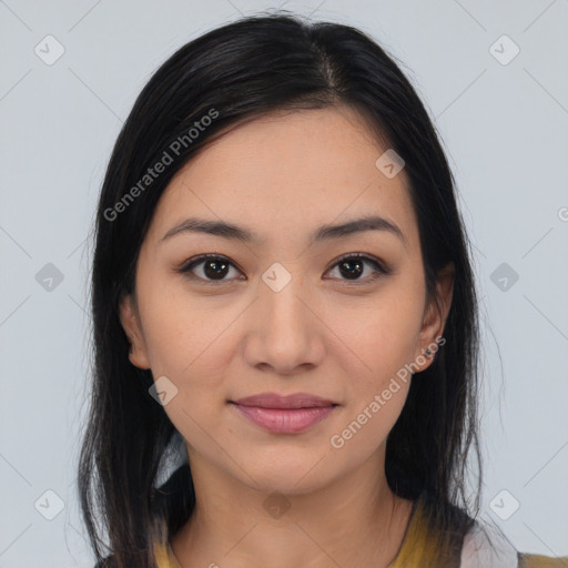 Joyful latino young-adult female with medium  brown hair and brown eyes