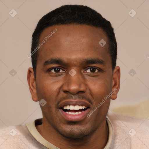 Joyful black young-adult male with short  black hair and brown eyes