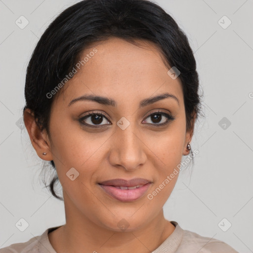 Joyful latino young-adult female with medium  brown hair and brown eyes