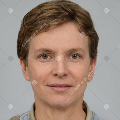 Joyful white adult male with short  brown hair and grey eyes