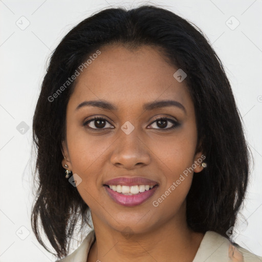 Joyful black young-adult female with medium  brown hair and brown eyes