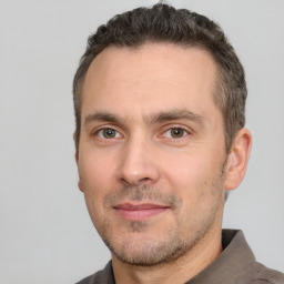 Neutral white adult male with short  brown hair and brown eyes