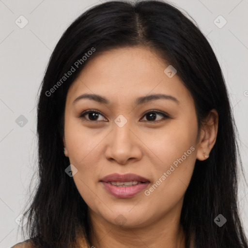 Joyful latino young-adult female with long  brown hair and brown eyes