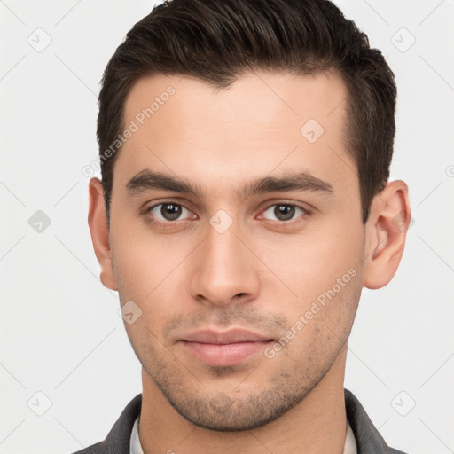 Neutral white young-adult male with short  brown hair and brown eyes