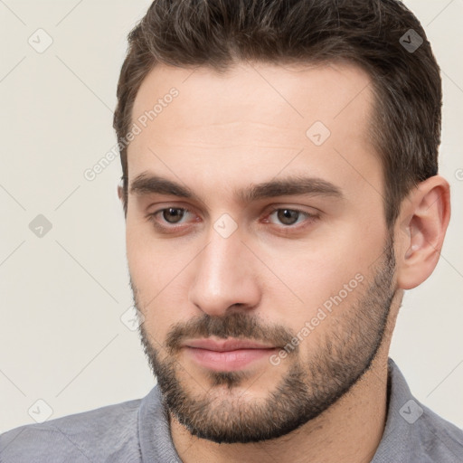 Neutral white young-adult male with short  brown hair and brown eyes