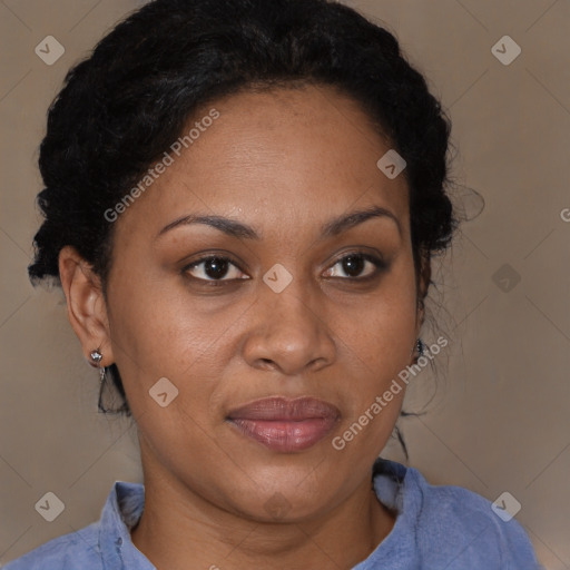 Joyful black adult female with short  brown hair and brown eyes