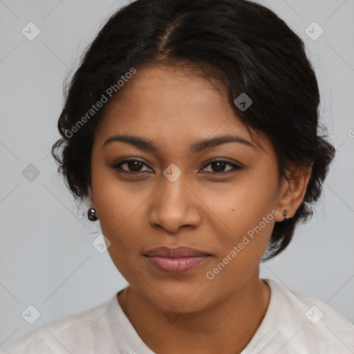 Joyful black young-adult female with medium  black hair and brown eyes