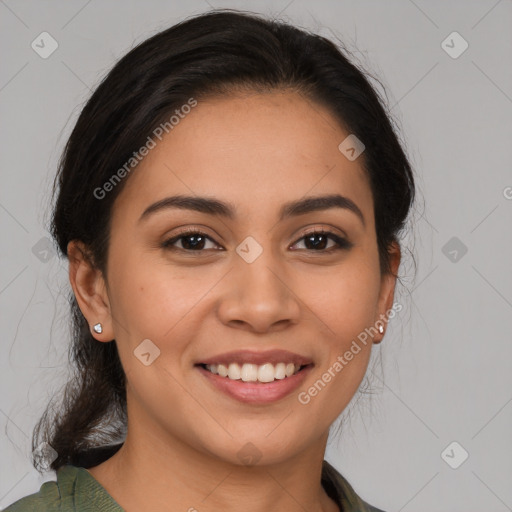 Joyful latino young-adult female with medium  brown hair and brown eyes