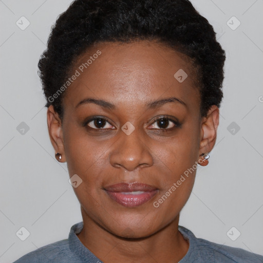 Joyful black young-adult female with short  black hair and brown eyes