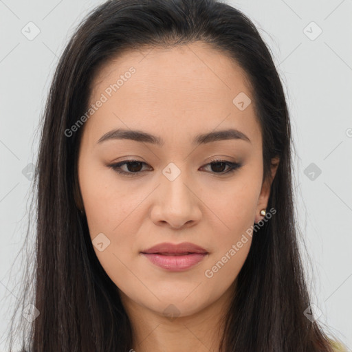 Joyful asian young-adult female with long  brown hair and brown eyes