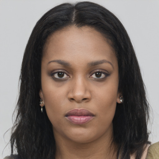 Joyful asian young-adult female with long  brown hair and brown eyes