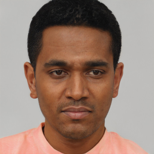 Neutral black young-adult male with short  black hair and brown eyes