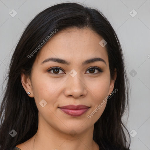 Joyful latino young-adult female with long  brown hair and brown eyes