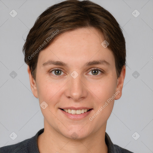 Joyful white young-adult female with short  brown hair and grey eyes