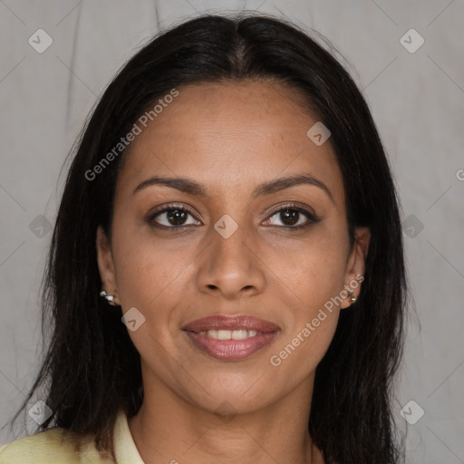 Joyful black young-adult female with long  brown hair and brown eyes